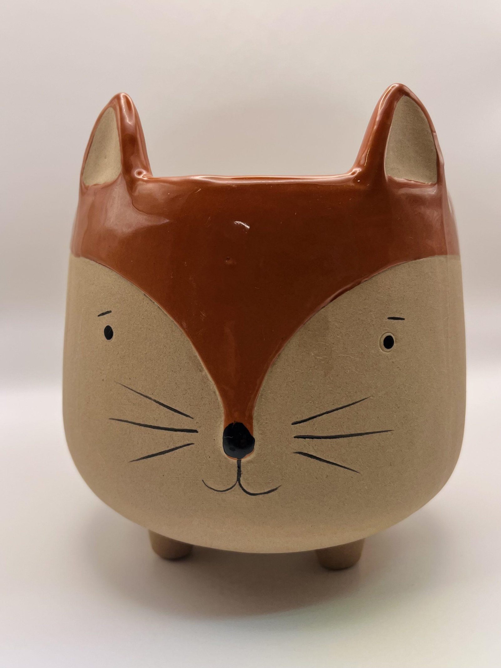 Cache pot renard
